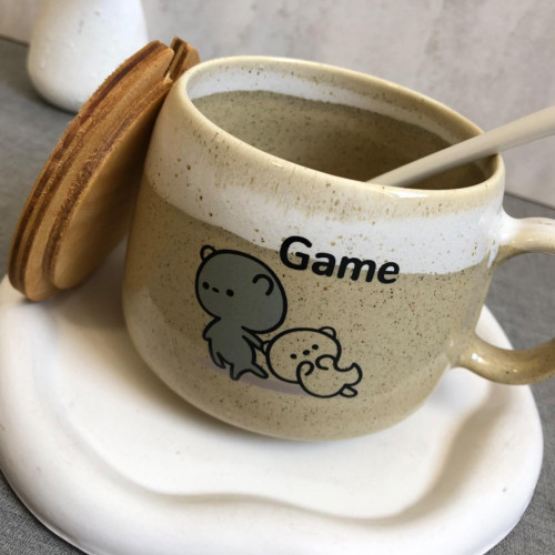 Fancy ceramic mug with wooden lid and spoon - an attractive gift