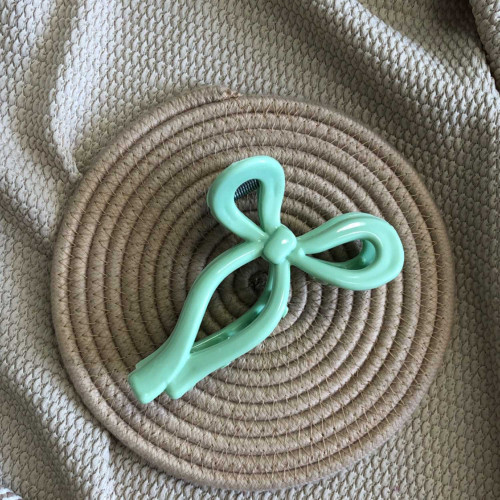 Fancy hair clips with Papion design in various colors