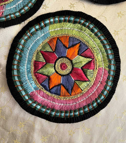 Hand-embroidered tablecloth