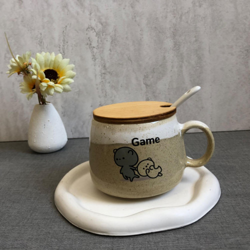 Fancy ceramic mug with wooden lid and spoon - an attractive gift