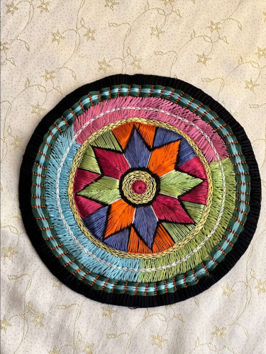 Hand-embroidered tablecloth