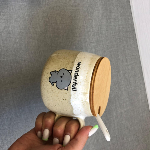 Fancy ceramic mug with wooden lid and spoon - an attractive gift